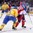MINSK, BELARUS - MAY 11: Czech Republic's Jakub Klepis #20 pulls the puck away from Sweden's Tim Erixon #4 during preliminary round action at the 2014 IIHF Ice Hockey World Championship. (Photo by Richard Wolowicz/HHOF-IIHF Images)

